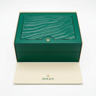 Boîte de montre Rolex verte avec logo, parfaite pour la montre rolex daytona john mayer.