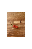 Pendentif corail brut de la mer Méditerranée, en corail naturel teinté de rose et d'orange.