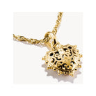 Charm cœur vintage plaqué or, design filigrane avec zirconium noir, bijou élégant à porter des deux côtés.