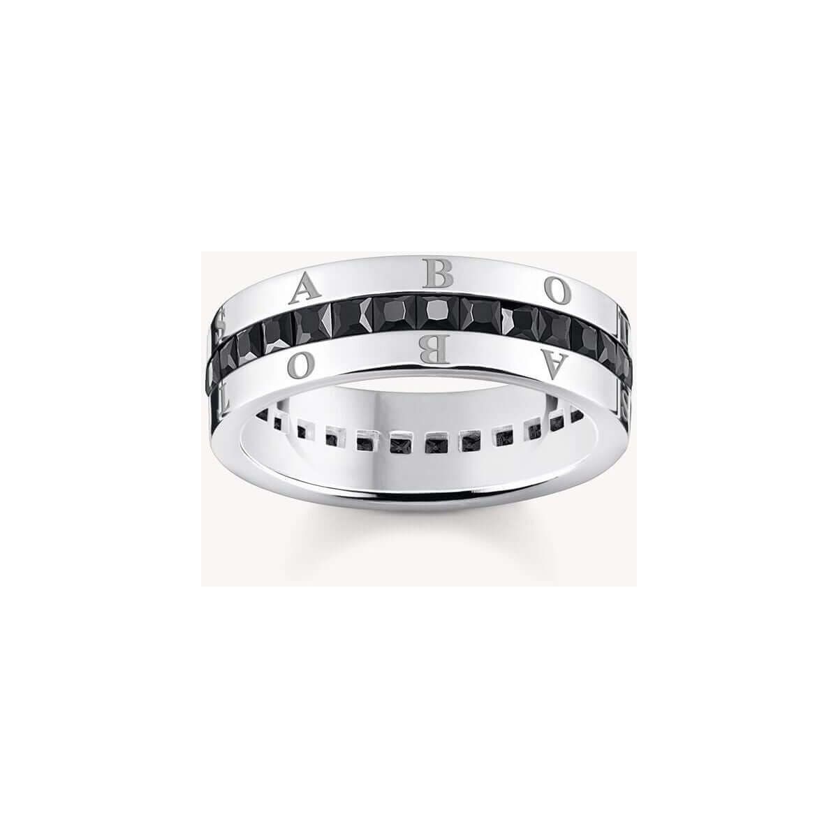 Bague ruban en argent 925 avec zircones noires, gravure élégante, design raffiné et confort optimal.