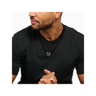 Man wearing a 60 cm black obsidian beads necklace with a decorative silver clasp.