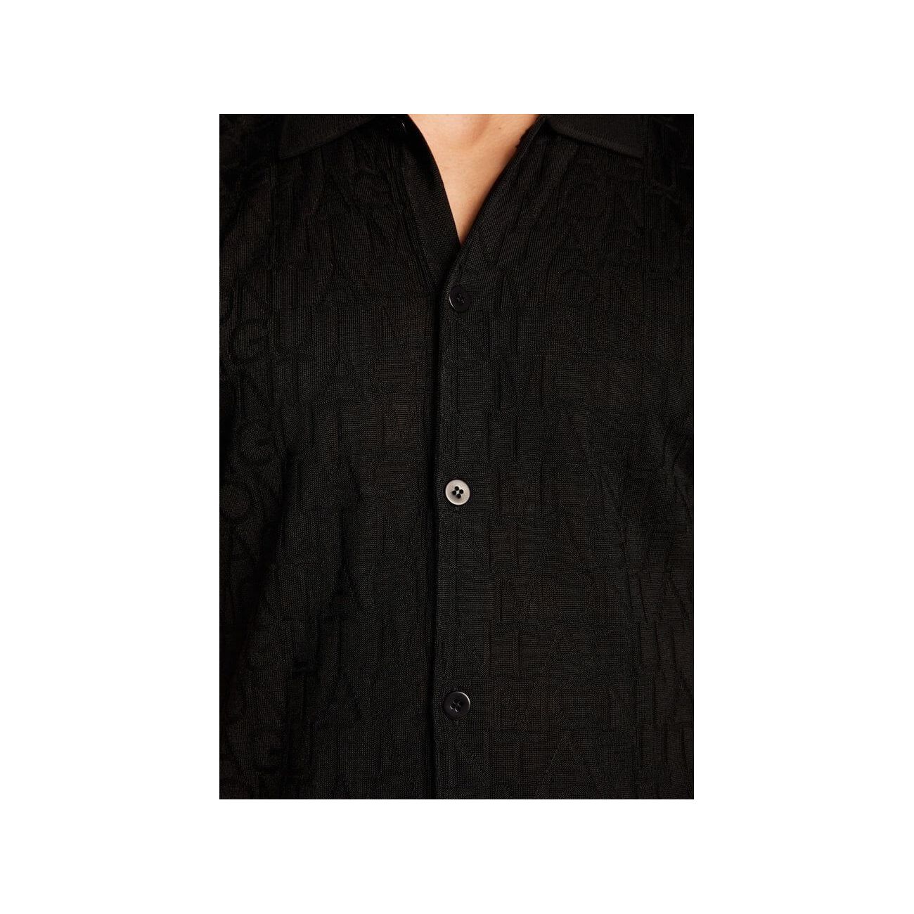 Chemise Matthew homme en polyamide noir, légère et moderne, offrant confort et style pour les journées ensoleillées.