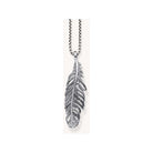 Pendentif plume Thomas Sabo en argent sterling noirci avec oxydes de zirconium, élégant et polyvalent.