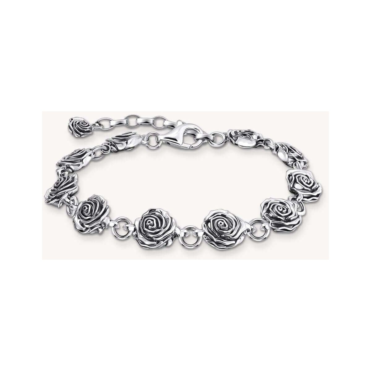 Bracelet Midnight Rose en argent recyclé avec roses tridimensionnelles et œillets flexibles, design élégant.
