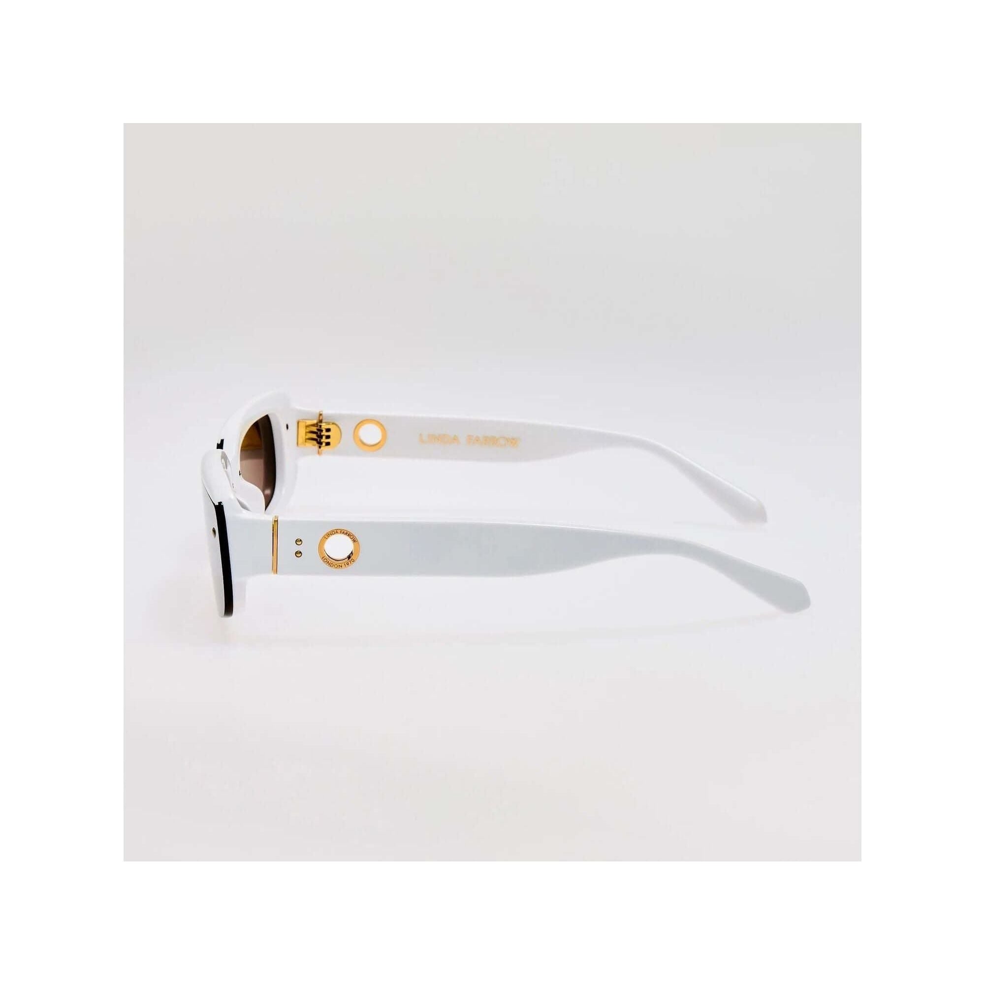 Lunettes de soleil Flick blanches en acétate, offrant élégance et protection UV à 100%.