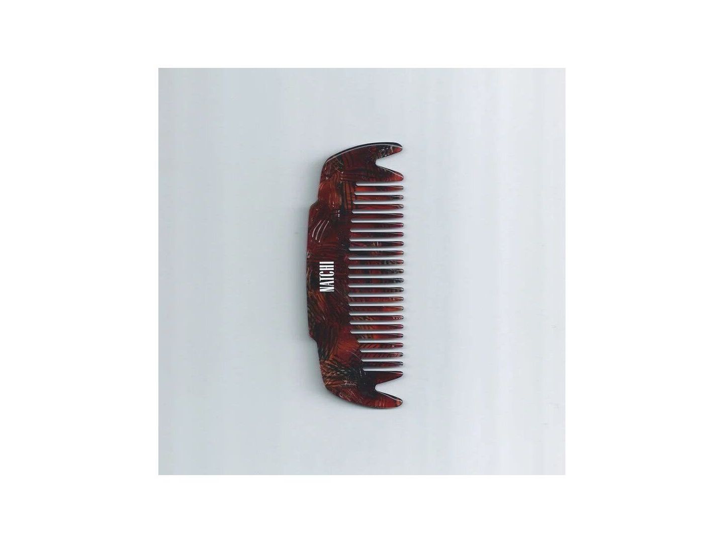 Peigne Coco en acétate de cellulose, idéal pour démêler, masser le cuir chevelu et favoriser la santé des cheveux.