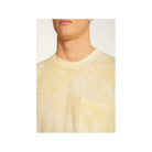 Close-up of the light yellow T-Shirt Marquez with a pocket, made from 100% organic cotton.