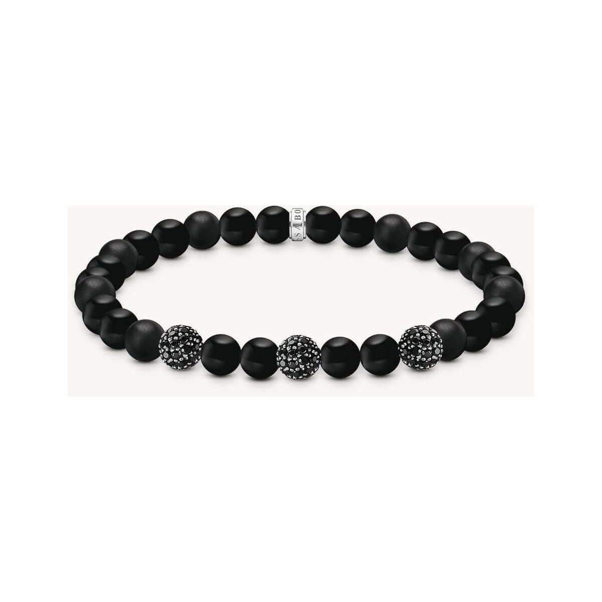 Bracelet en obsidienne mate et polie, ornée de zirconium noir, style rock-chic et élégant.