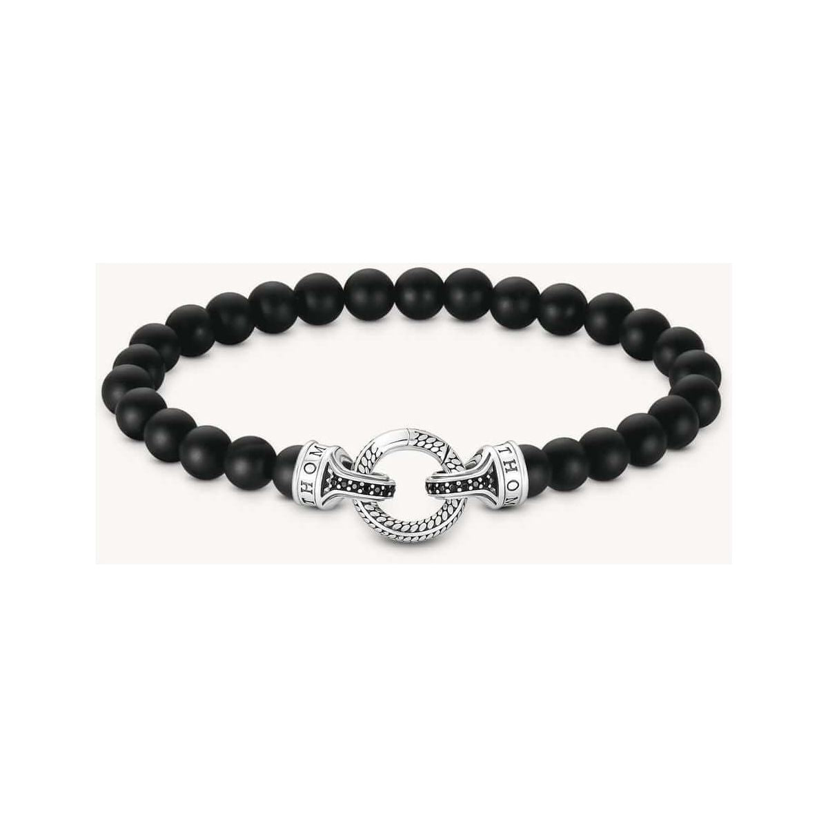 Bracelet en beads d'obsidienne noire mate avec fermoir en argent recyclé et embouts en zirconium noir.