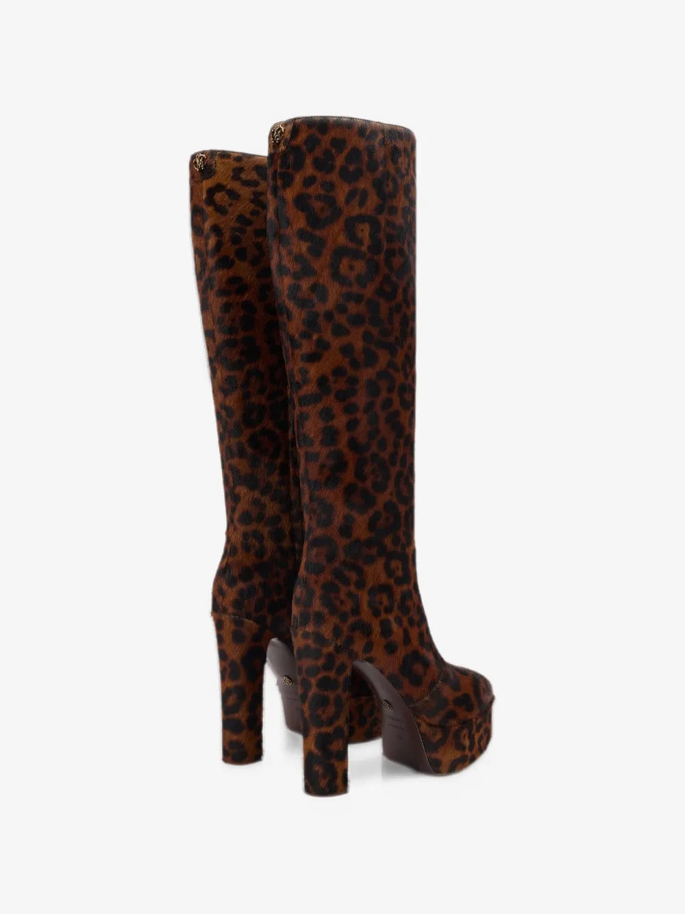 Bottes leopard-print platform à talon épais et design chic, incarnant le glamour audacieux.