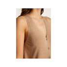 Gilet à manches courtes en lin flammé Dara, offrant une texture légère et élégante pour les journées chaudes.