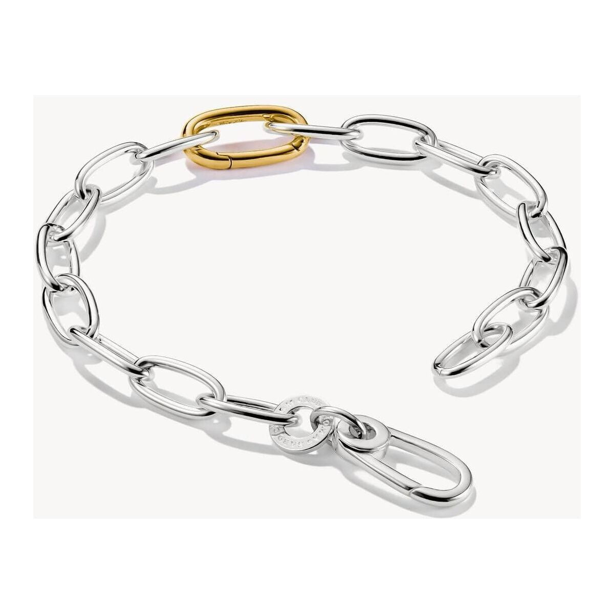 Bracelet charm bicolore en argent recyclé, avec maillon central plaqué or 18k, design moderne.