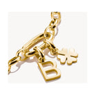 Gold-plated charm pendant featuring a heart-shaped four-leaf clover and 'B' letter, ideal for stylish jewelry.