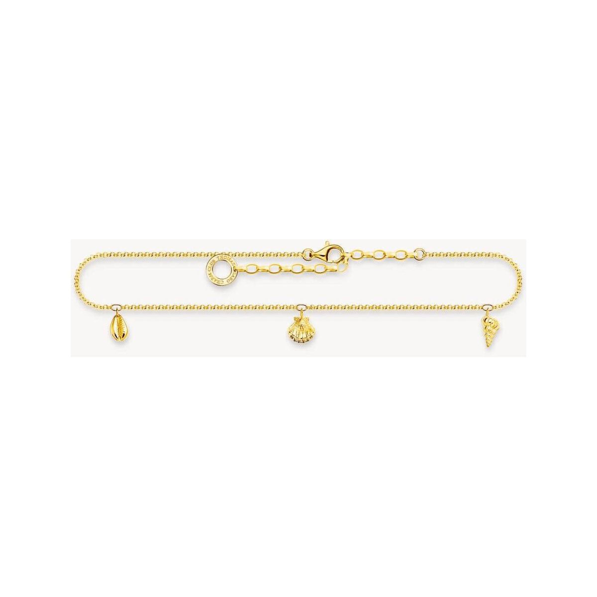 Chaîne de cheville en or jaune 18 carats avec trois coquillages en décoration, élégante et ajustable.