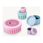 Colorful Charm Club gift boxes in pastel shades for elegant jewelry storage.