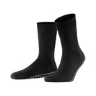 Chaussettes Homepads FALKE noires avec picots en silicone pour une adhérence optimale à la maison.