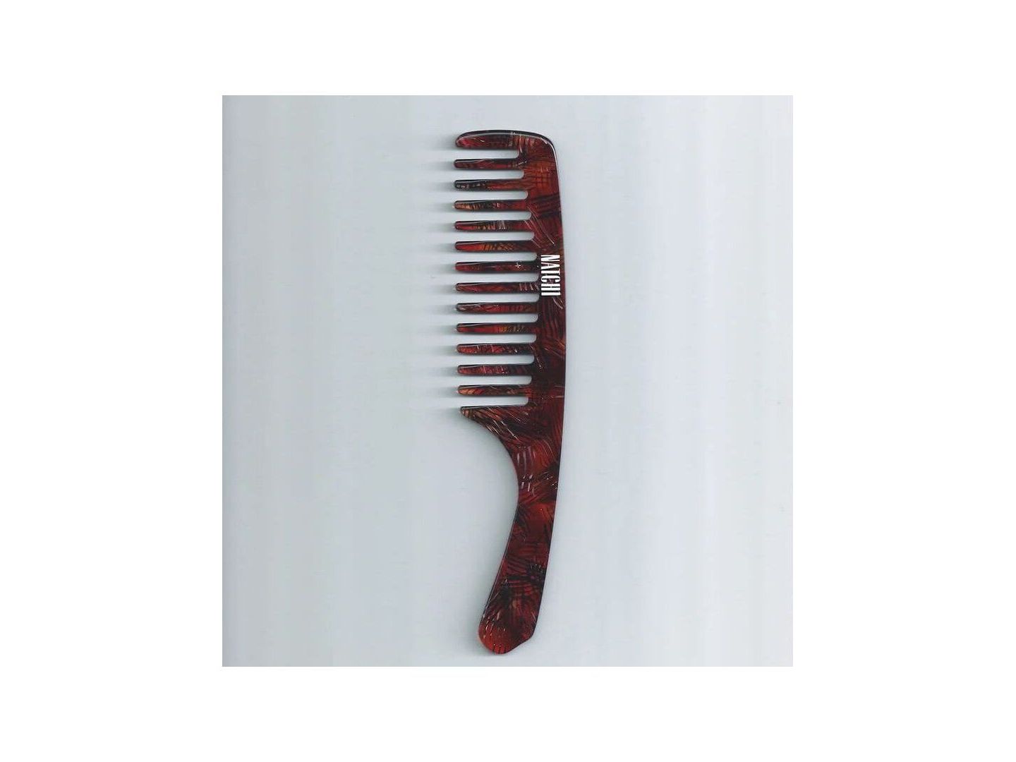 Peigne Wet Comb en acétate de cellulose, dents larges pour démêler les cheveux sans les casser.