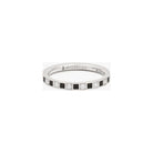 Alliance rêve ring with black and white diamonds, set in a sleek band, showcasing a contemporary design.