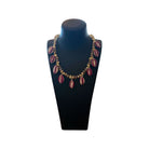 Collier avec coquillages et perles, élégant et unique, parfait pour toutes les occasions.