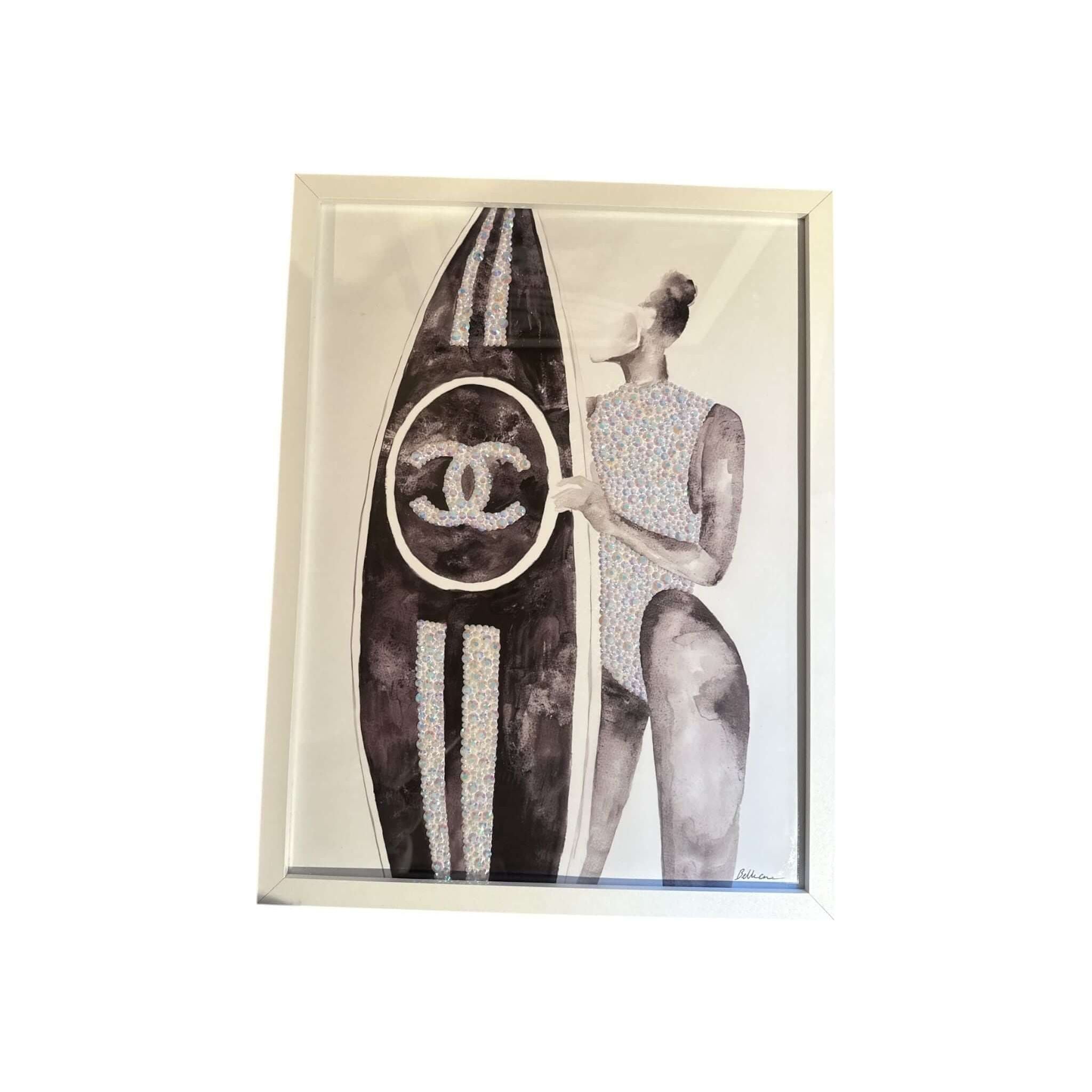 Art print of a stylish woman with a Chanel surfboard, showcasing a fashionable and chic beach aesthetic.