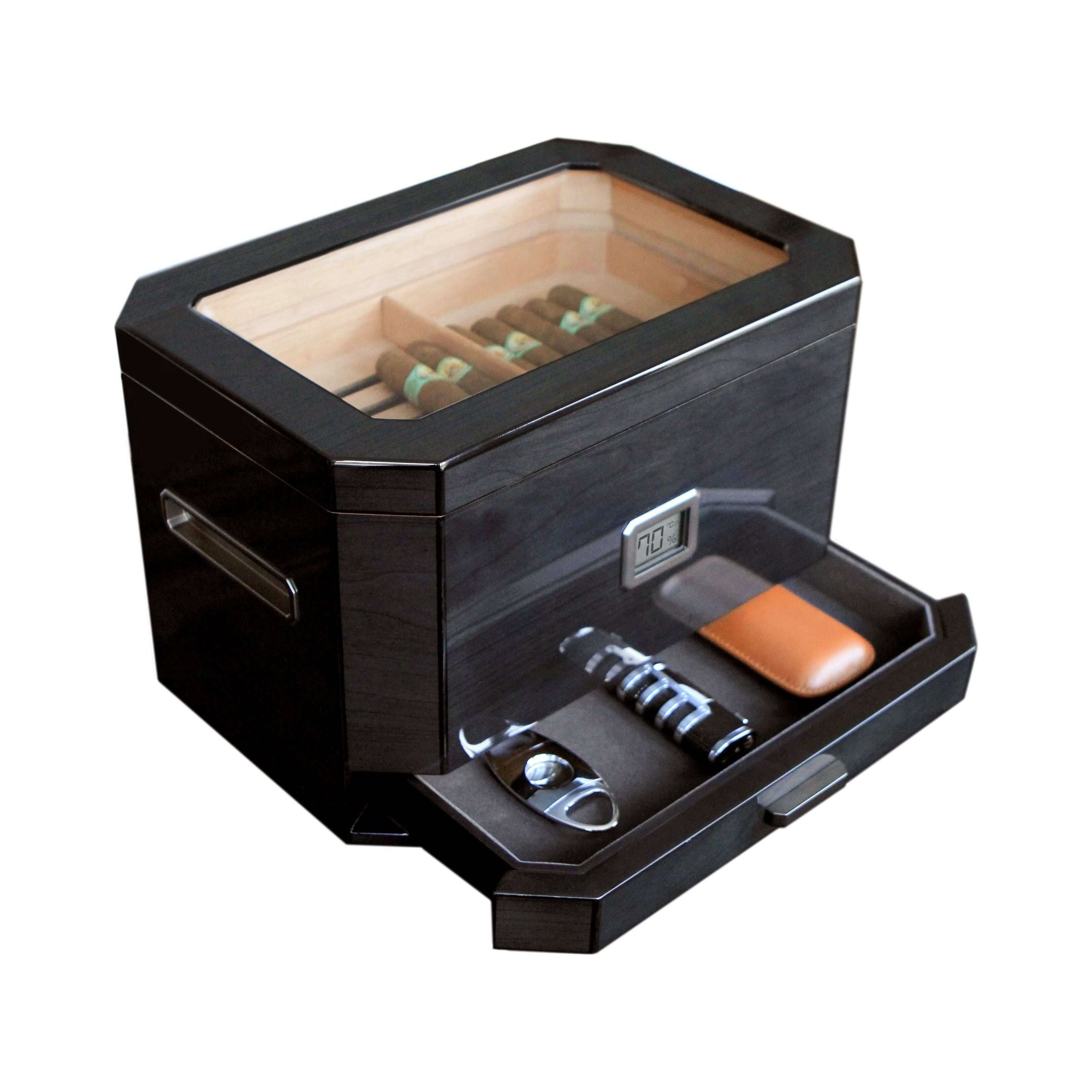 Humidor à couvercle en verre Octodor de Klaro avec cigares et accessoires élégants.