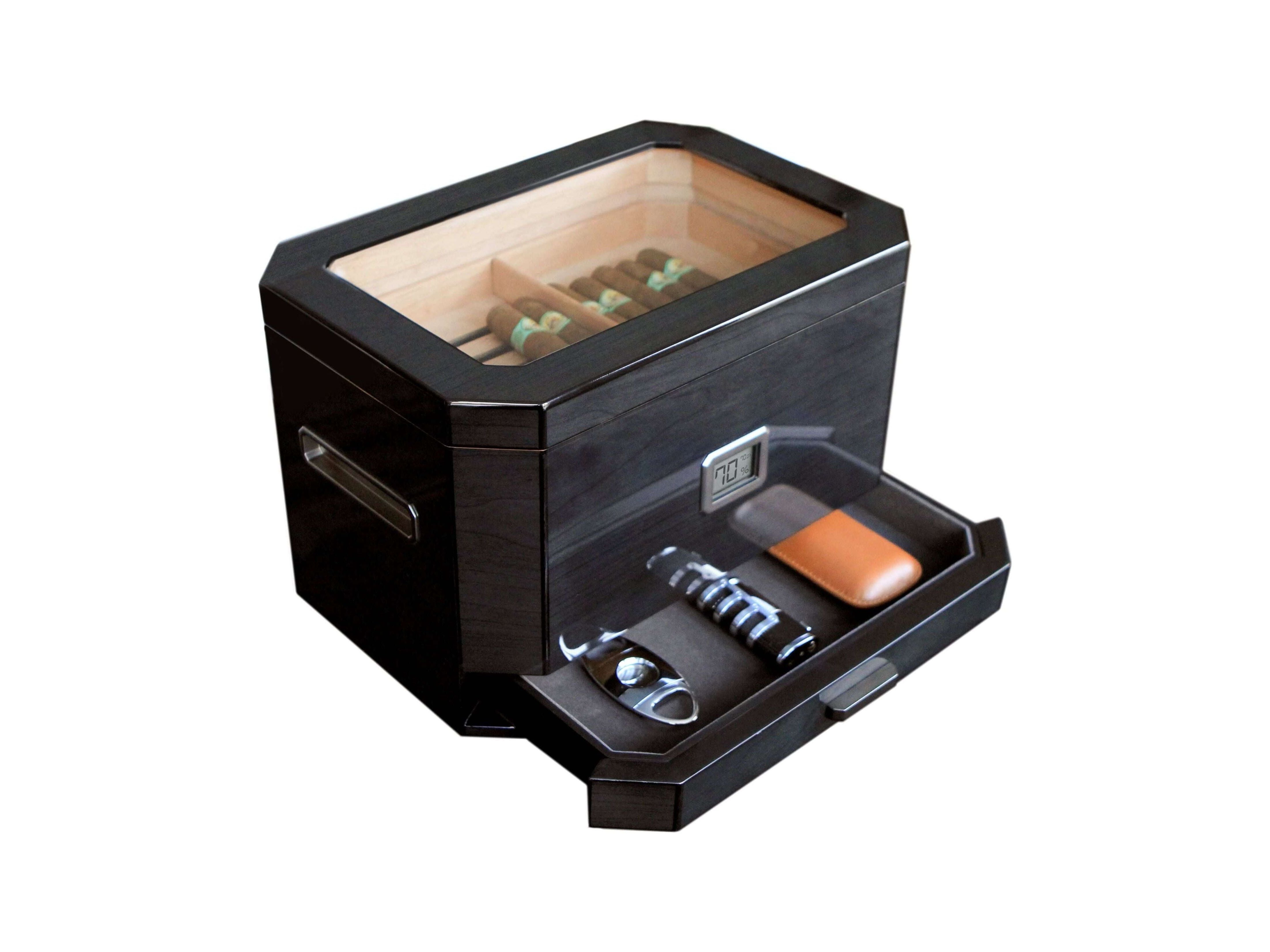 Humidor à couvercle en verre Octodor de Klaro avec cigares et accessoires élégants.