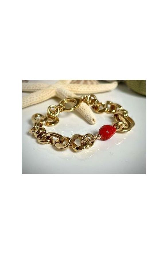 Bracelet Créazione en or avec maillons et perle de corail rouge de Méditerranée, design élégant et durable.